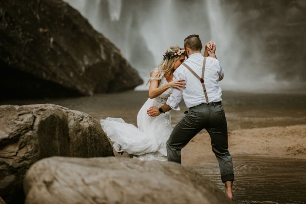 waterfall exploring with couple