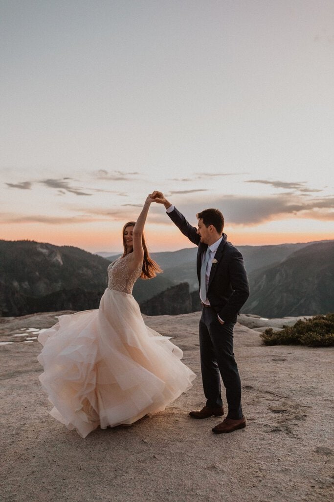 Couple dances at sunset in Yosemite national park.
