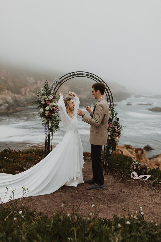 bride and groom celebrate marriage at Garrapata State Park.