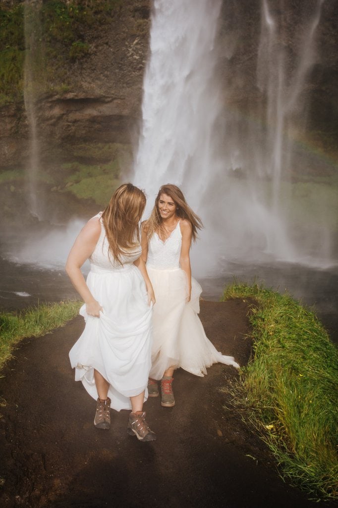 Brides hiking in Iceland's caves