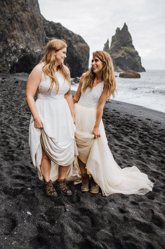 Brides in their dresses and hiking boots.
