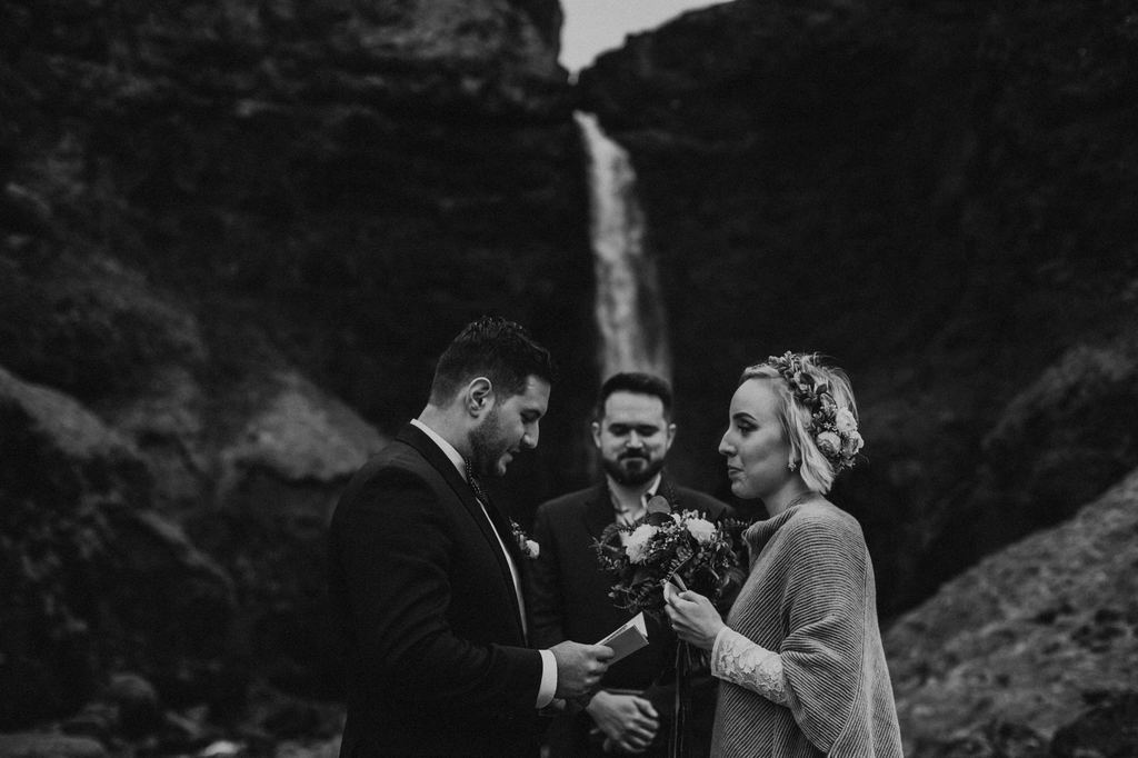 officiant marrying bride and groom in Iceland.
