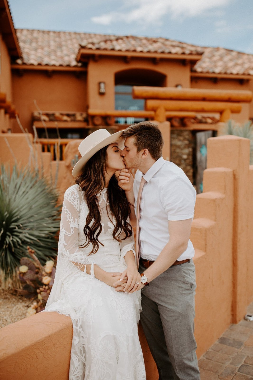 Groom kisses his bride for Arizona elopement.