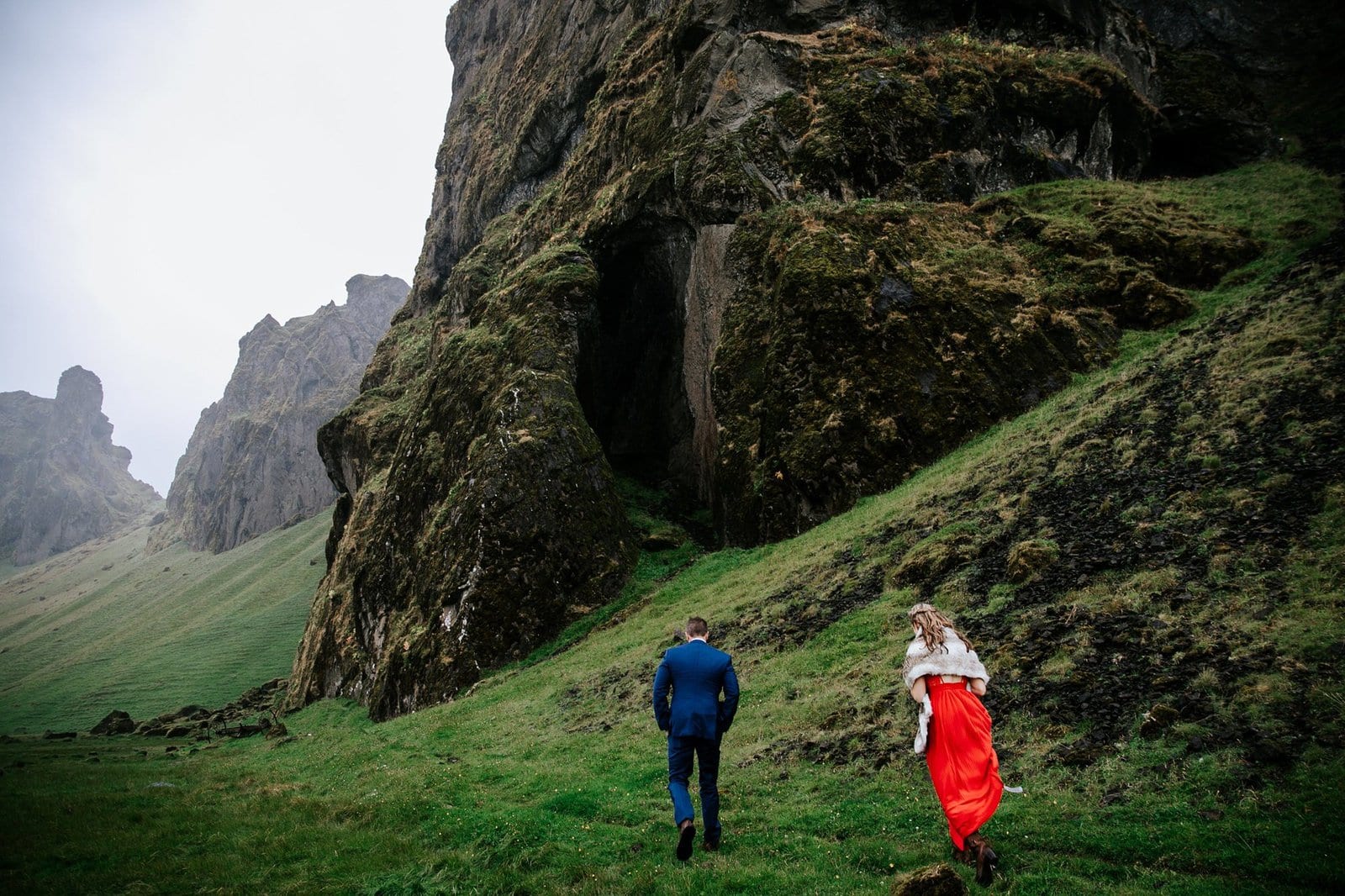 Bride and groom hiking in Iceland.
