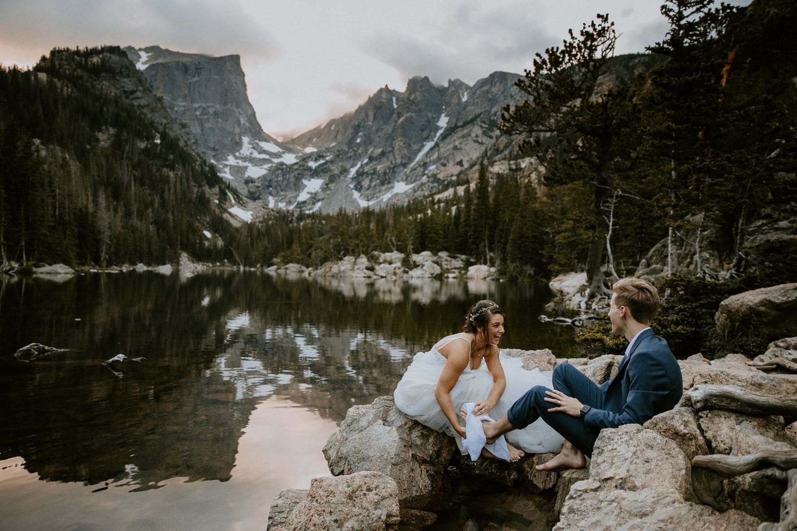 bride washing groom's feet at Rocky Mountain Park.