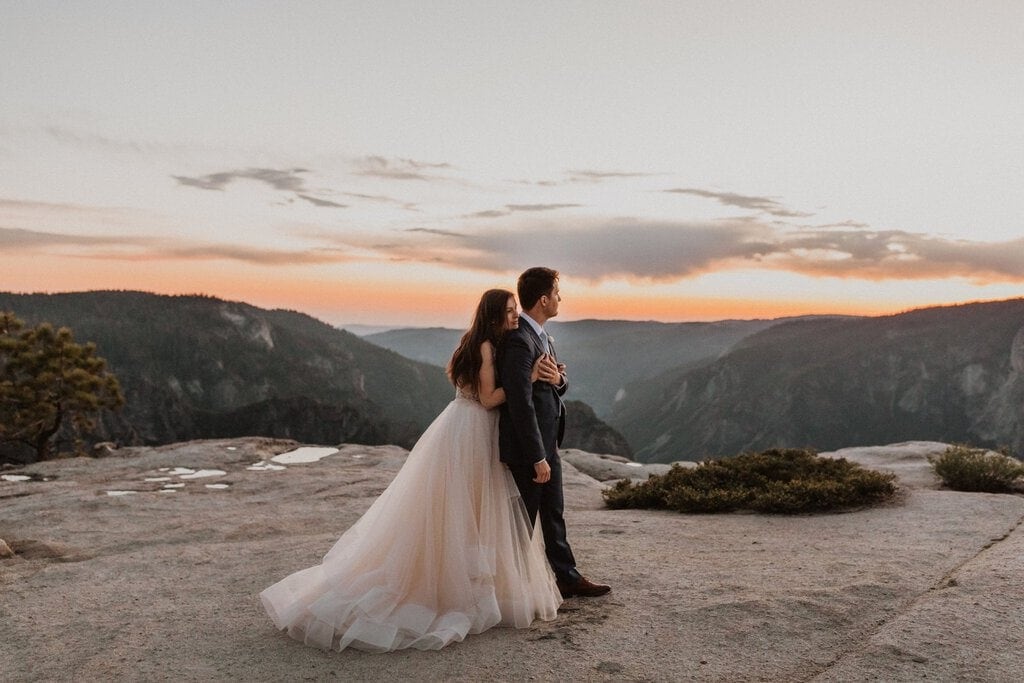 couple hugging at taft point sunset elopement