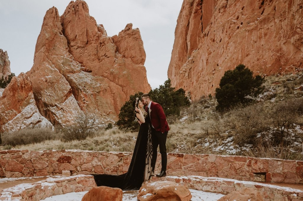Garden of the Gods elopement in the winter featuring snow on the red rocks